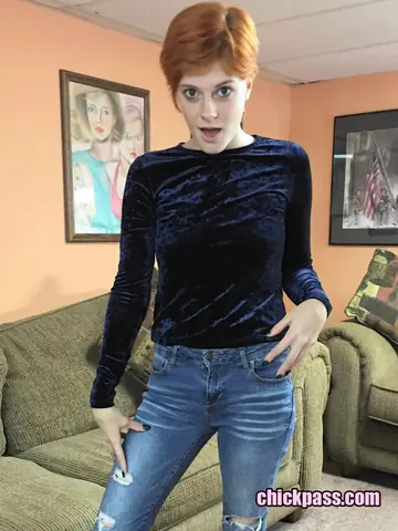 Redhead MILF in Jeans Masturbates with a Dildo on the Sofa