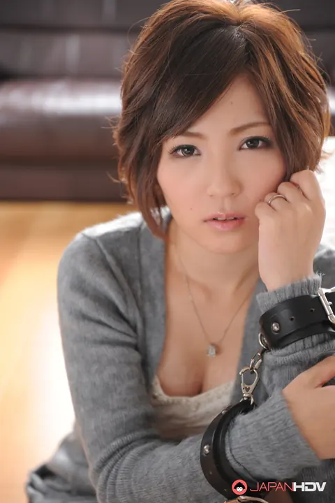 Kaede Oshiro: Japanese MILF Stands Handcuffed and Gagged in a Skirt – photo 13 of 15