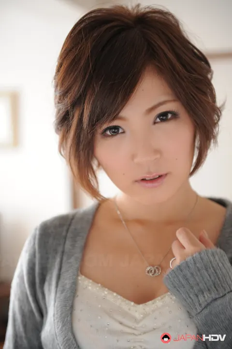 Kaede Oshiro: Japanese MILF Stands Handcuffed and Gagged in a Skirt – photo 4 of 15
