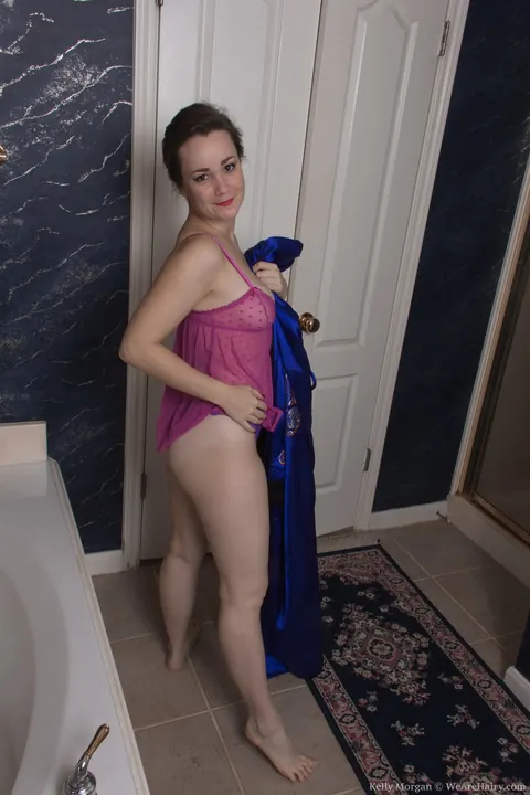 Kelly Morgan: Petite Short-Haired Brunette Soaps Hairy Pussy in the Bathroom – photo 2 of 21