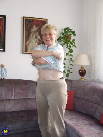 Busty Mature Blonde Spreads Her Pussy Wide