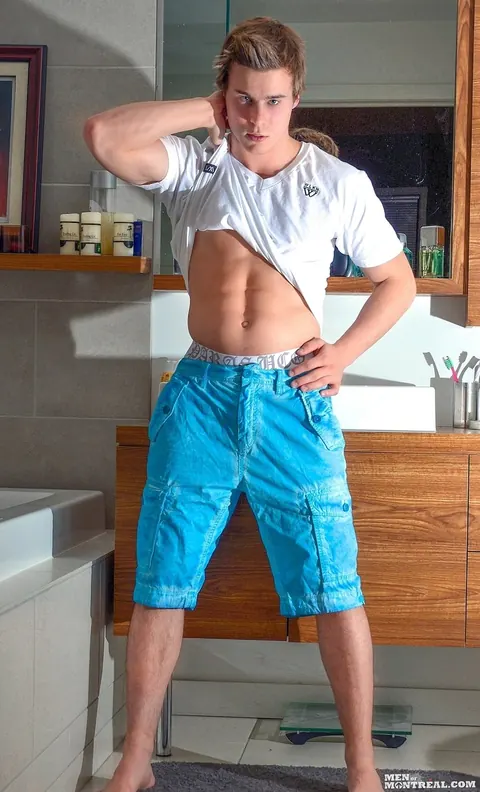 Athletic Guy Strokes His Big Cock in the Bathroom – photo 2 of 15