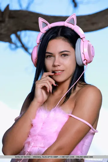 Black-Haired Woman Strips Out of Her Panties on an Ocean Cliff