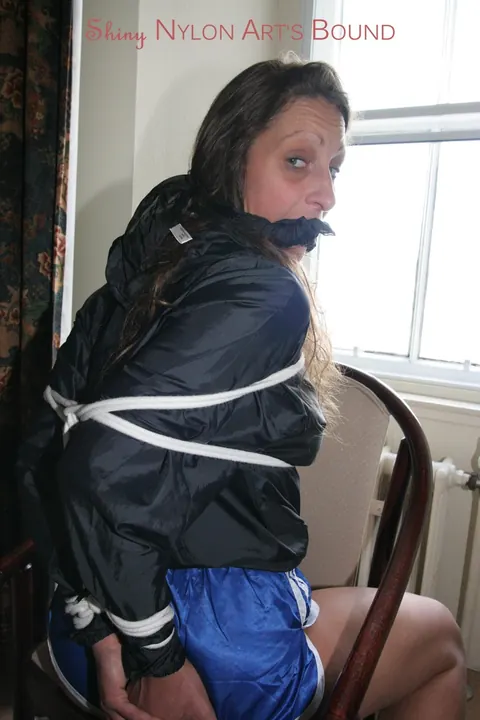 Brunette in Shorts Removes Gag While Tied Up – photo 15 of 16