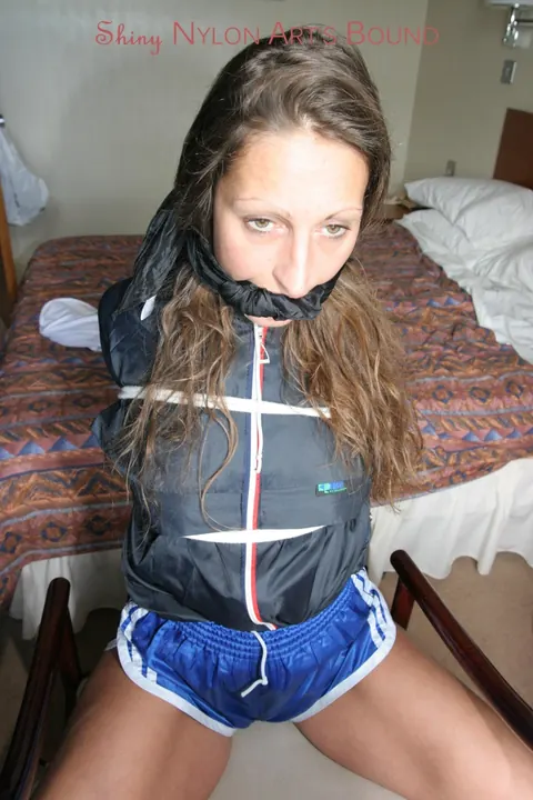 Brunette in Shorts Removes Gag While Tied Up – photo 13 of 16
