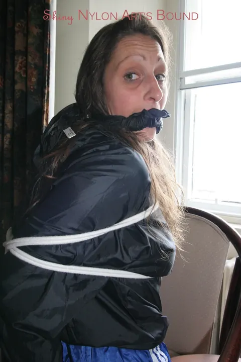 Brunette in Shorts Removes Gag While Tied Up – photo 4 of 16