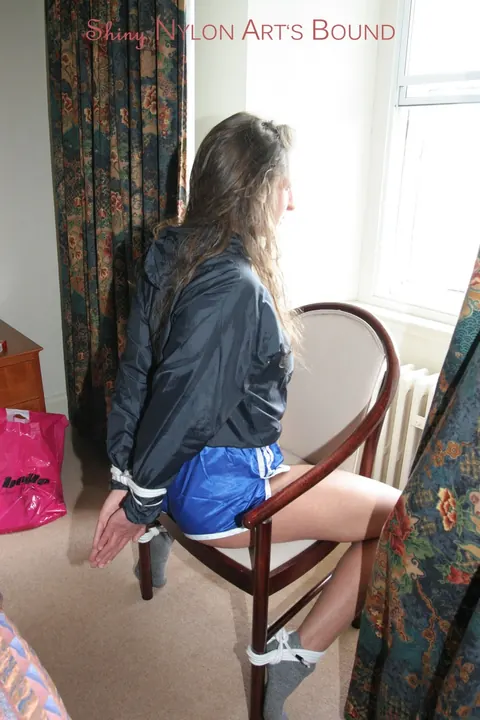 Brunette in Shorts Removes Gag While Tied Up – photo 6 of 16