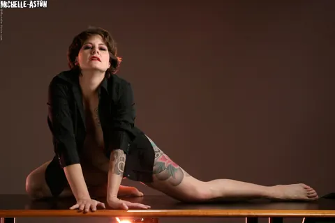 Michelle Aston: Tattooed Brunette MILF Strips Nude and Poses – photo 4 of 15