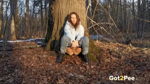 Nikky B: European Brunette in Jeans and Boots Poses Outdoors by a Tree – photo 6 of 15