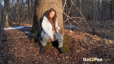 Nikky B: European Brunette in Jeans and Boots Poses Outdoors by a Tree – photo 5 of 15