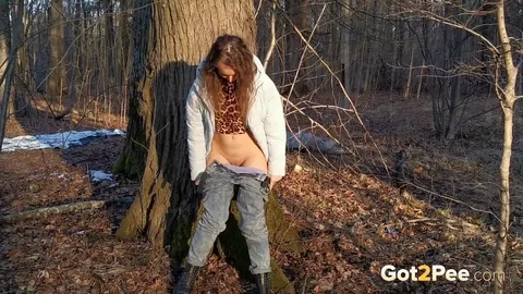 Nikky B: European Brunette in Jeans and Boots Poses Outdoors by a Tree – photo 4 of 15