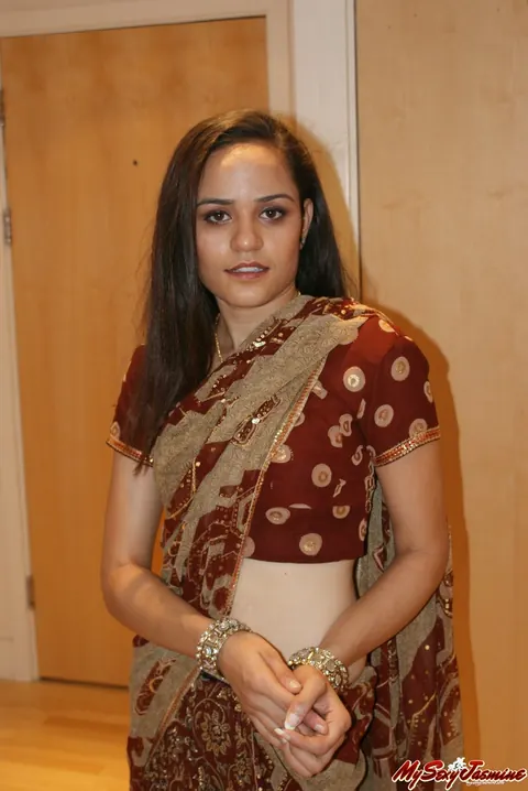 Indian Woman Strips Out of Her Lingerie on the Bed – photo 1 of 12