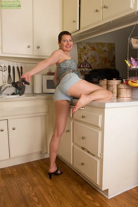 Kali Karinena: Thick Mature Brunette Strips Out of Her Shorts in the Kitchen – photo 2 of 16
