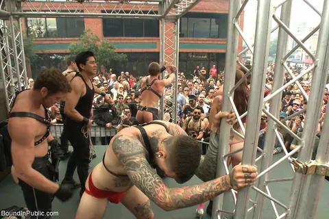 Two Men Kiss and Play with Bondage Restraints Outdoors – photo 9 of 21