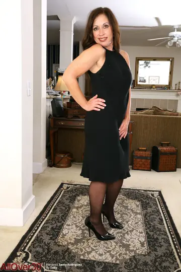 Busty Latina MILF Strips Off Her Stockings and Skirt Then Spreads Wide