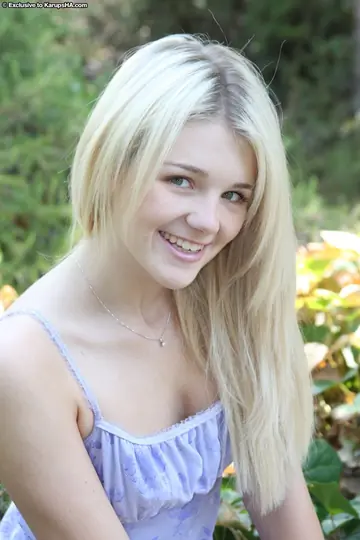 Blonde with Small Natural Tits Spreads Her Shaved Pussy in the Open Air