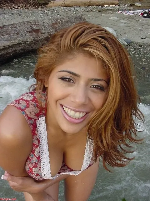 Slim Latina Redhead Flaunts Her Big Tits and Trimmed Pussy on the Beach – photo 8 of 21
