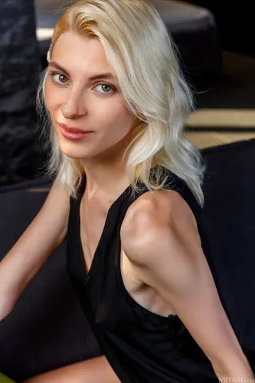 Ukrainian Blonde Strips Nude and Poses Sensually