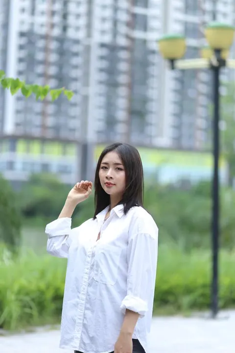 Asian Woman Strips Out of Her Shorts and Top Outdoors – photo 12 of 21