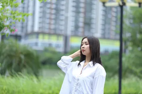 Asian Woman Strips Out of Her Shorts and Top Outdoors – photo 11 of 21