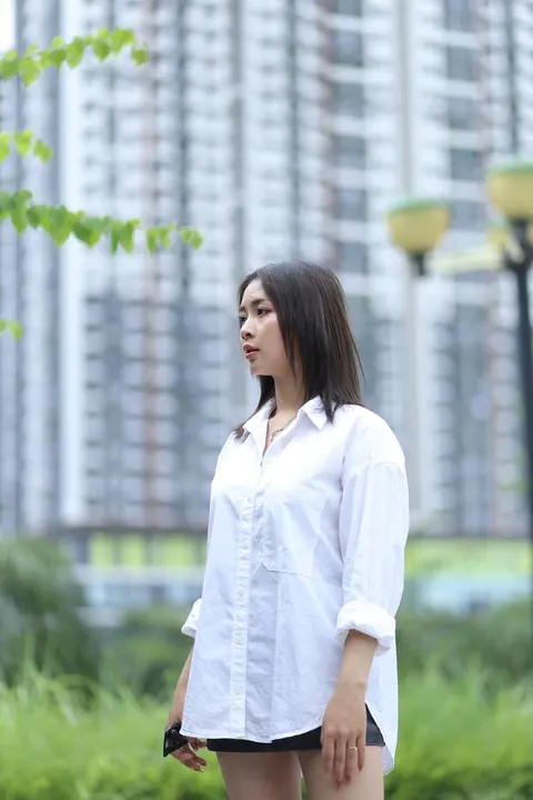 Asian Woman Strips Out of Her Shorts and Top Outdoors – photo 14 of 21