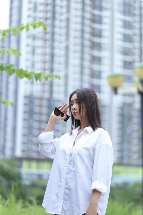Asian Woman Strips Out of Her Shorts and Top Outdoors – photo 15 of 21