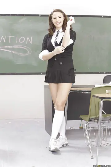 Tattooed Brunette with Big Tits Strips Out of Her Uniform and Spreads