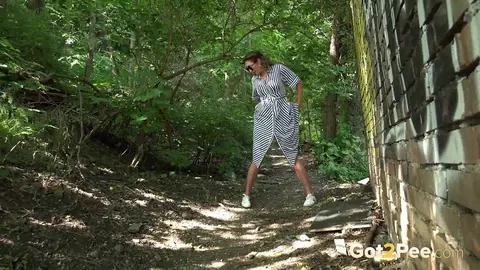 Julia North: Mature Brunette in a Skirt and Glasses Spreads on a Forest Path – photo 15 of 15