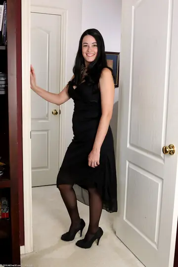 Black-Haired MILF in Stockings and Panties Spreads Her Hairy Pussy