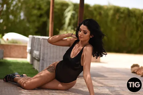 Sarah Long: British Black-Haired Woman Strips Out of Her Bikini Outdoors – photo 3 of 21