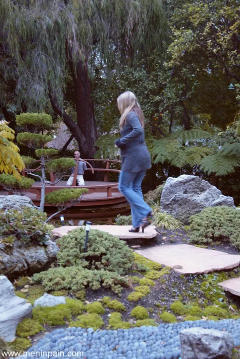 Blonde Dominatrix Controls Bound Man in Jeans Outdoors – photo 2 of 17