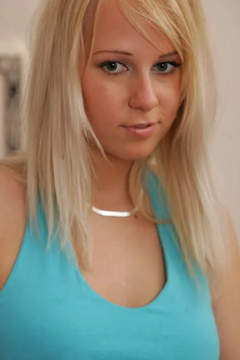 Blonde Peels Off Her Skirt and Spreads Her Shaved Pussy – photo 2 of 21