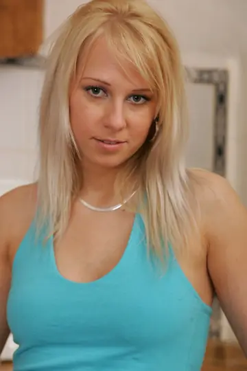 Blonde Peels Off Her Skirt and Spreads Her Shaved Pussy