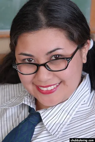 Thick Asian Brunette in Glasses Strips Out of Her Lingerie