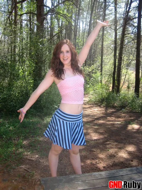 Pale Redhead Bares Her Natural Tits and Shaved Pussy on a Picnic Table – photo 3 of 12