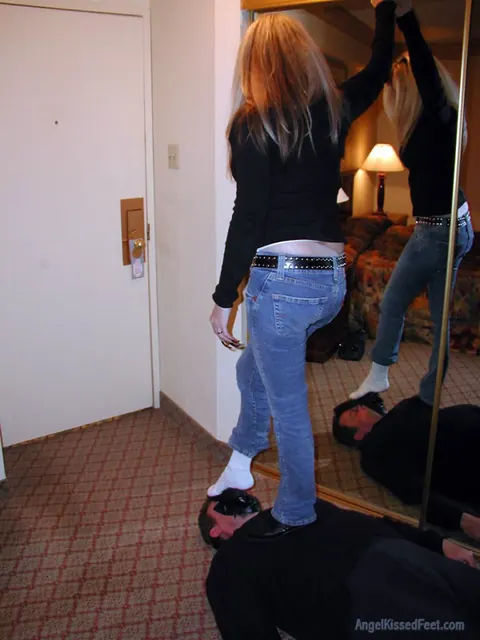Mature Blonde PAWG Tramples Him in Boots and Jeans – photo 11 of 15