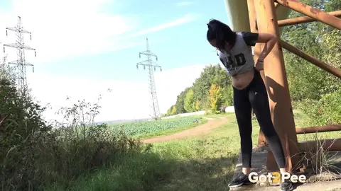 Esperansa: Brunette Undresses Outdoors and Spreads Her Pussy to Pee – photo 15 of 15