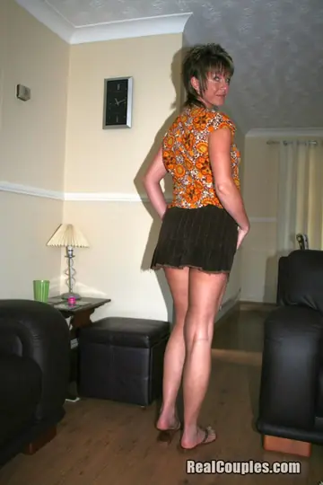 MILF Undresses and Kisses Before a Threesome