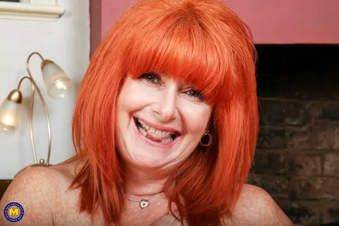 Amber Vixxxen: Curvy Mature Redhead Unzips Her Leather Skirt and Spreads Her Legs Wide – photo 16 of 16