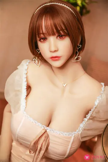Woman Slips Out of Her Dress and Bares Her Big Tits