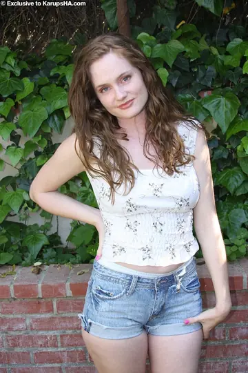 Redhead Strips Nude to Flaunt Her Natural Tits