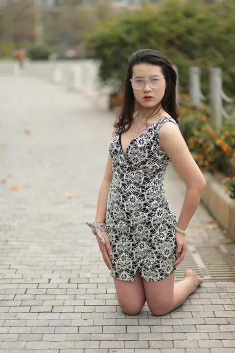 Thick Asian Woman in a Skirt and Glasses Poses Clothed – photo 5 of 21