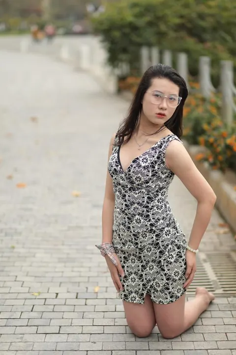 Thick Asian Woman in a Skirt and Glasses Poses Clothed – photo 6 of 21