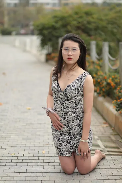 Thick Asian Woman in a Skirt and Glasses Poses Clothed – photo 3 of 21