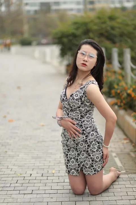Thick Asian Woman in a Skirt and Glasses Poses Clothed – photo 4 of 21