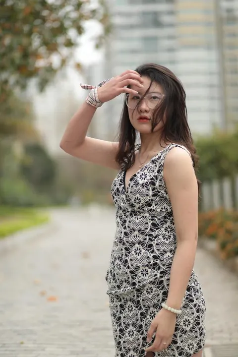 Thick Asian Woman in a Skirt and Glasses Poses Clothed – photo 10 of 21