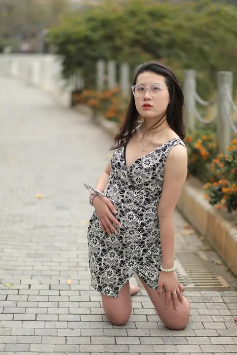 Thick Asian Woman in a Skirt and Glasses Poses Clothed – photo 2 of 21