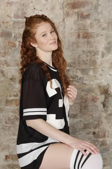 Curly Redhead in Stockings and Socks Fingers Her Pussy