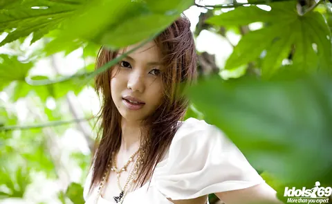 Yura Aikawa: Petite Asian Babe with Big Tits Strips Outdoors by the Office – photo 1 of 16