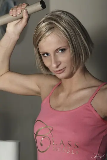 Paris Pink – German Blonde in Panties Poses in a Hotel Room